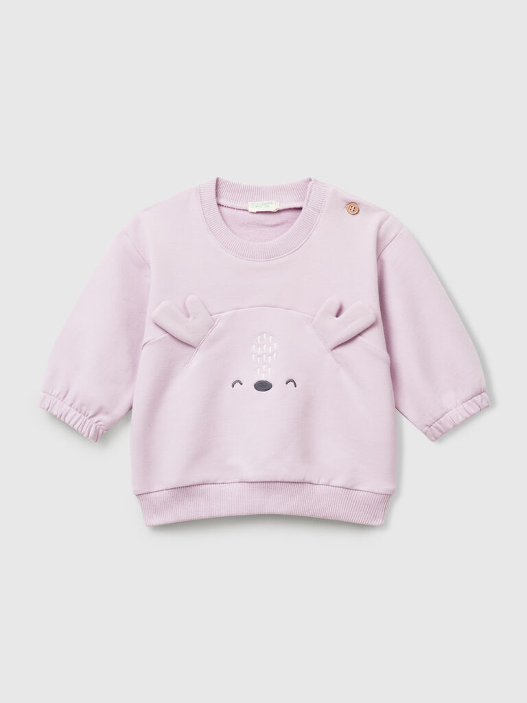 Sweatshirt with embroidery and patches