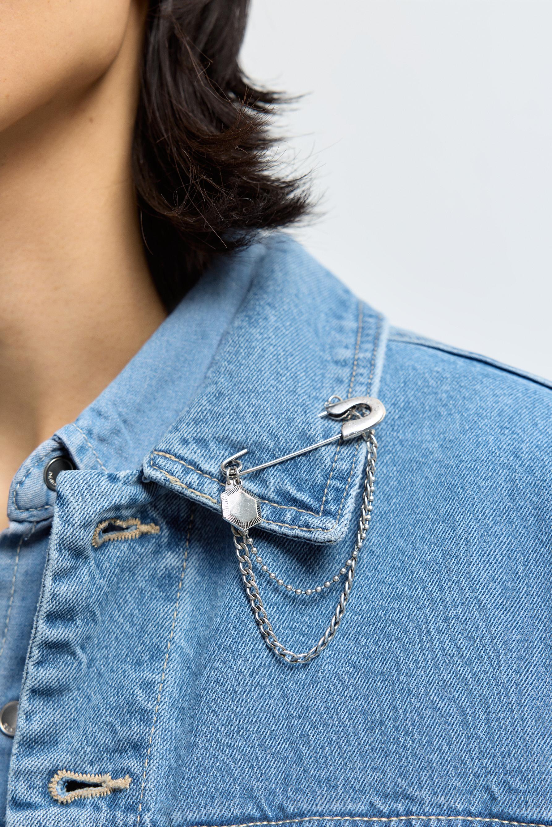 Broche imperdible con cadena