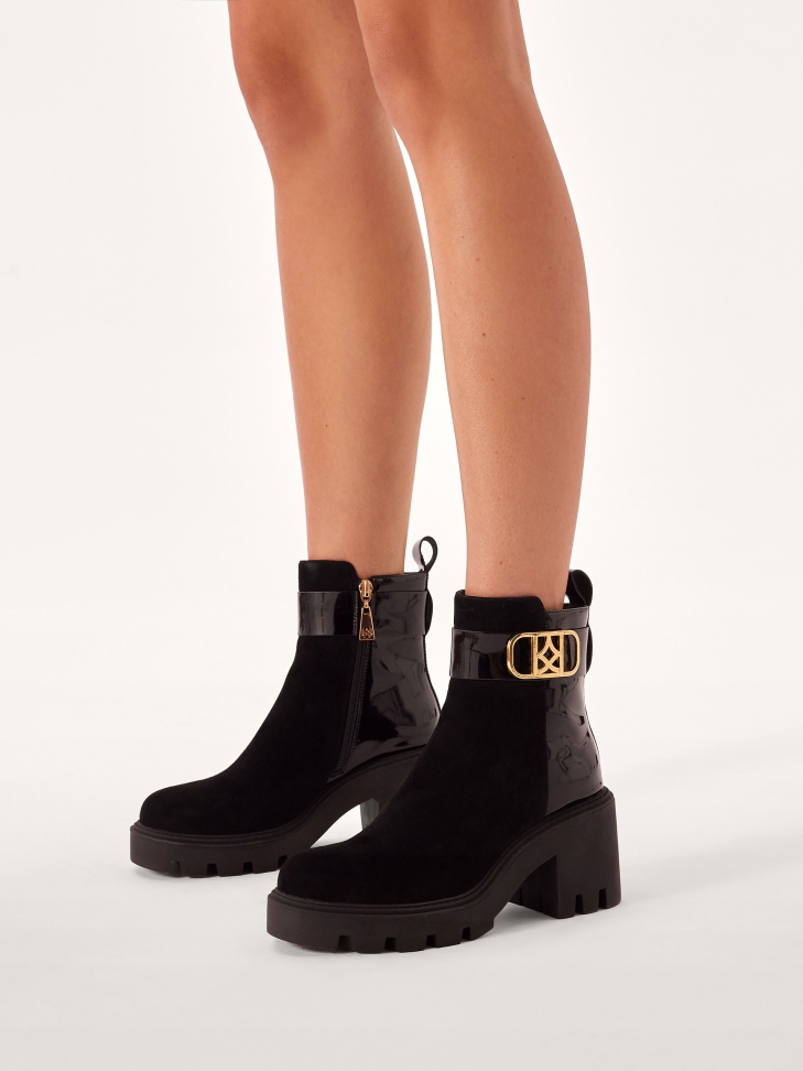 Comfortable boots on a wide block made of combined materials