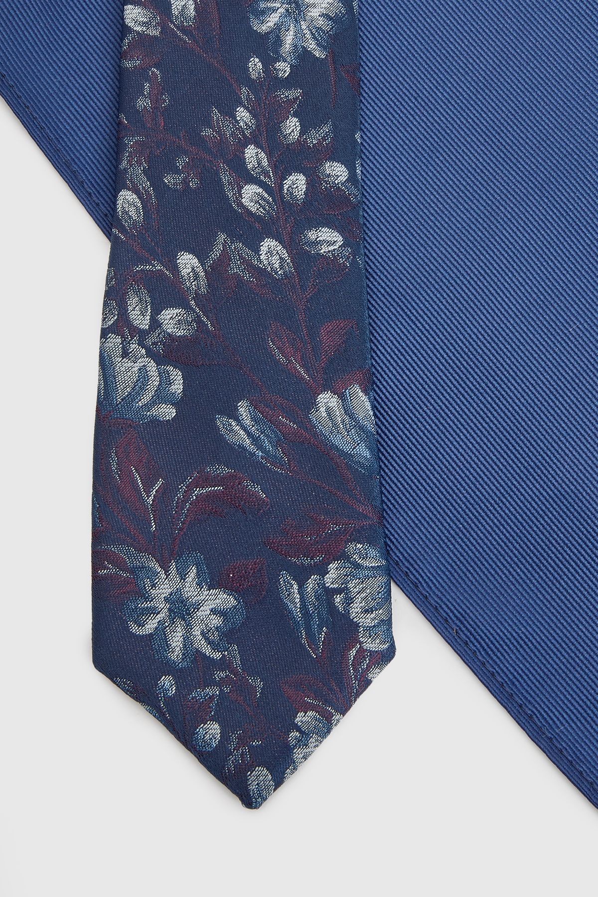 Burton Navy Multi Floral Tie and Plain Pocket Square