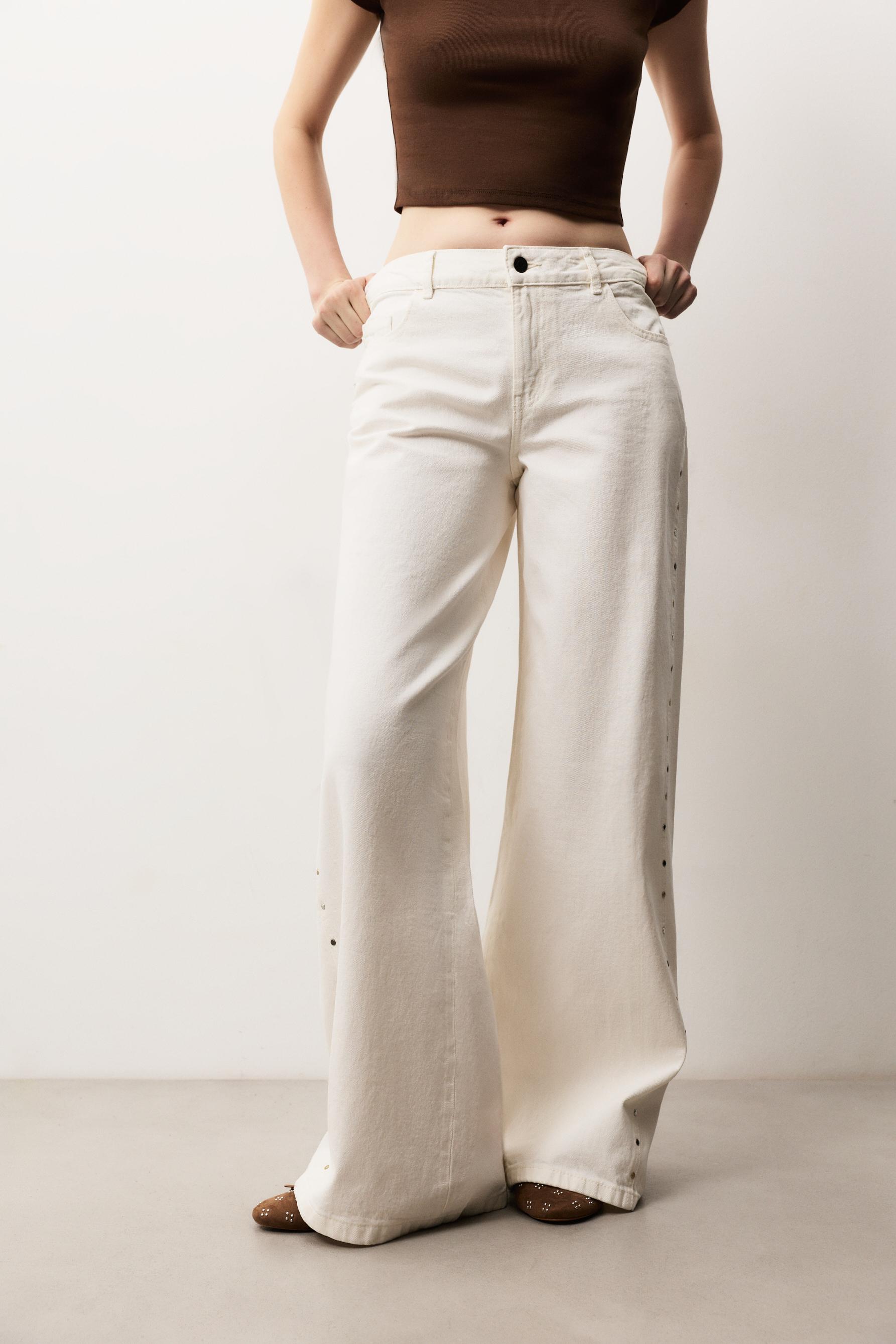 Jeans wide leg tachas