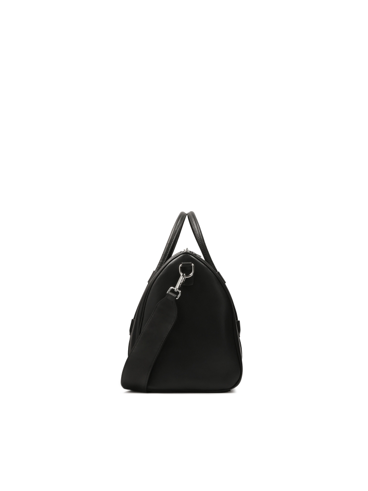Black hand and shoulder travel bag
