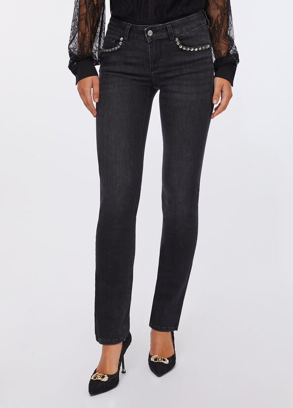 Jeans slim con strass