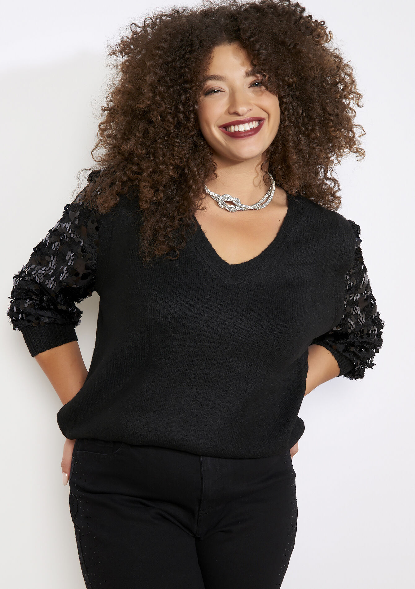 Trui met V-hals en pailletten