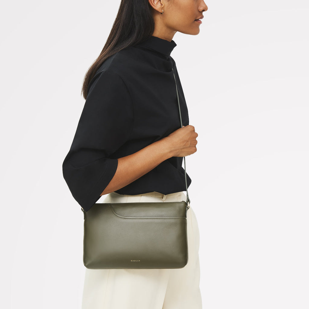 Pockets - Medium Ziptop East-West Cross Body Bag