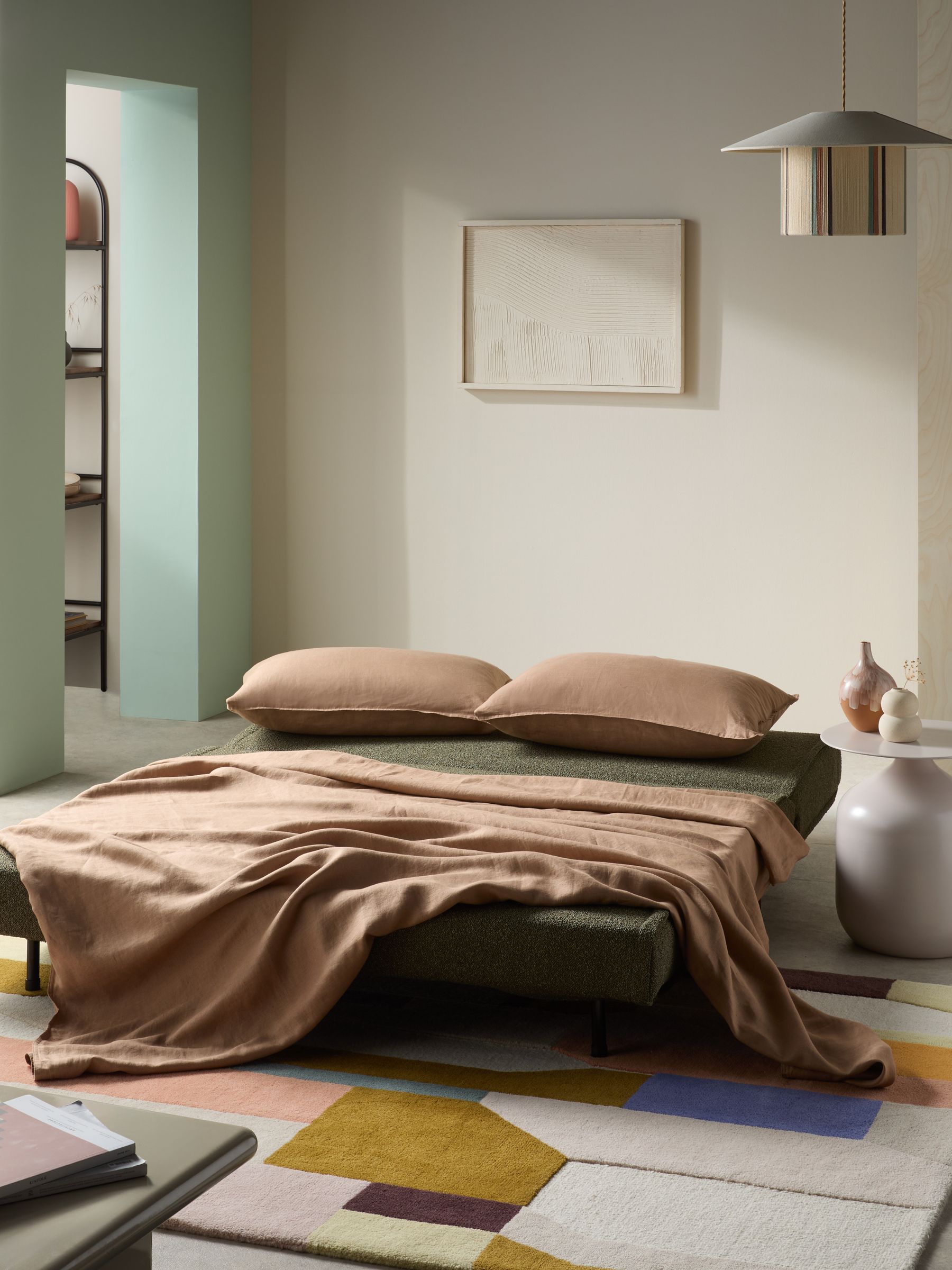 Large Haru 2 Seater Sofa Bed in Forrest Green Pax Boucle