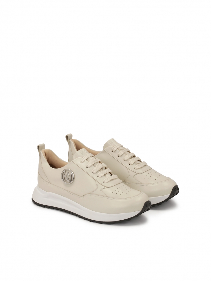 Comfortable sneakers decorated with a silver monogram