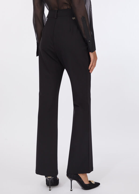 Pantaloni flare a vita alta