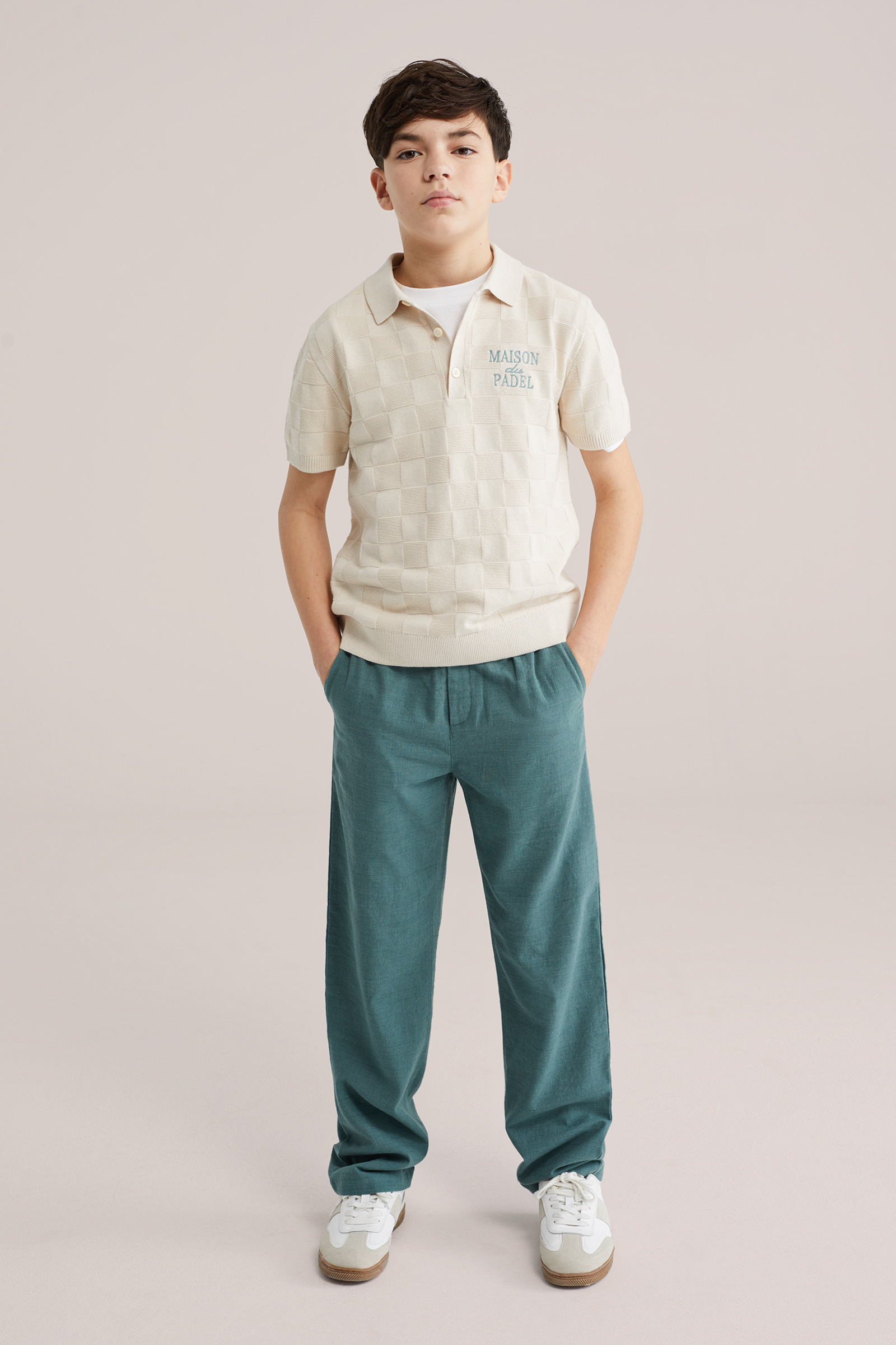 Jongens gebreide polo met structuur en embroidery