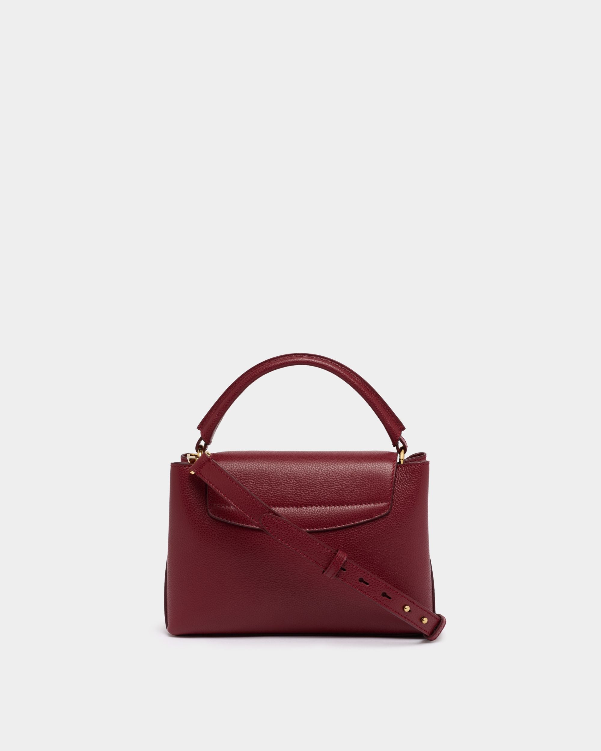 Lock Me Small Top Handle Bag in Ruby Red Grained Leather