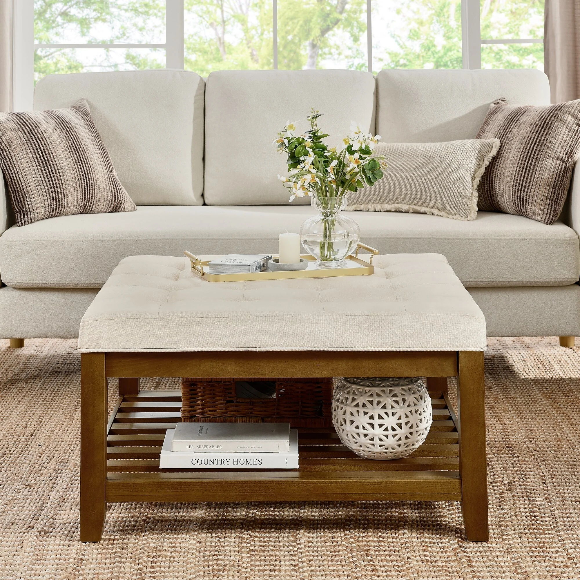 Coffee table with tufted linen upholstery