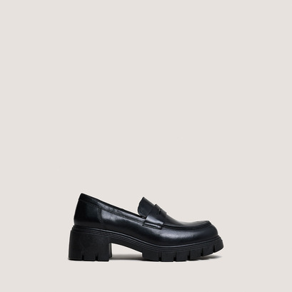 Mocassins à talons et semelles crantées....en cuir noir | ARON