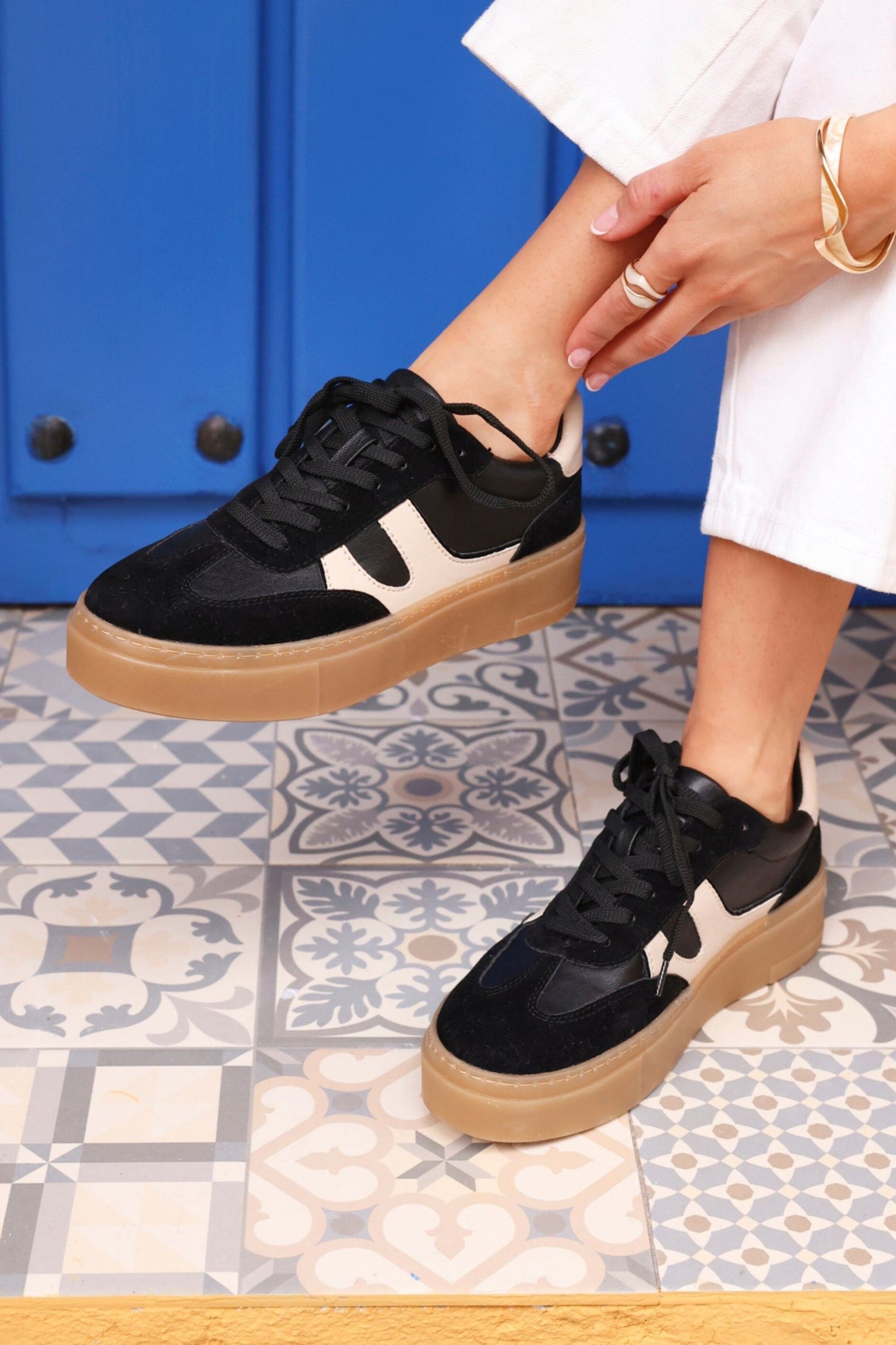 Linzi Kaia Black and Nude Faux Leather Trainers