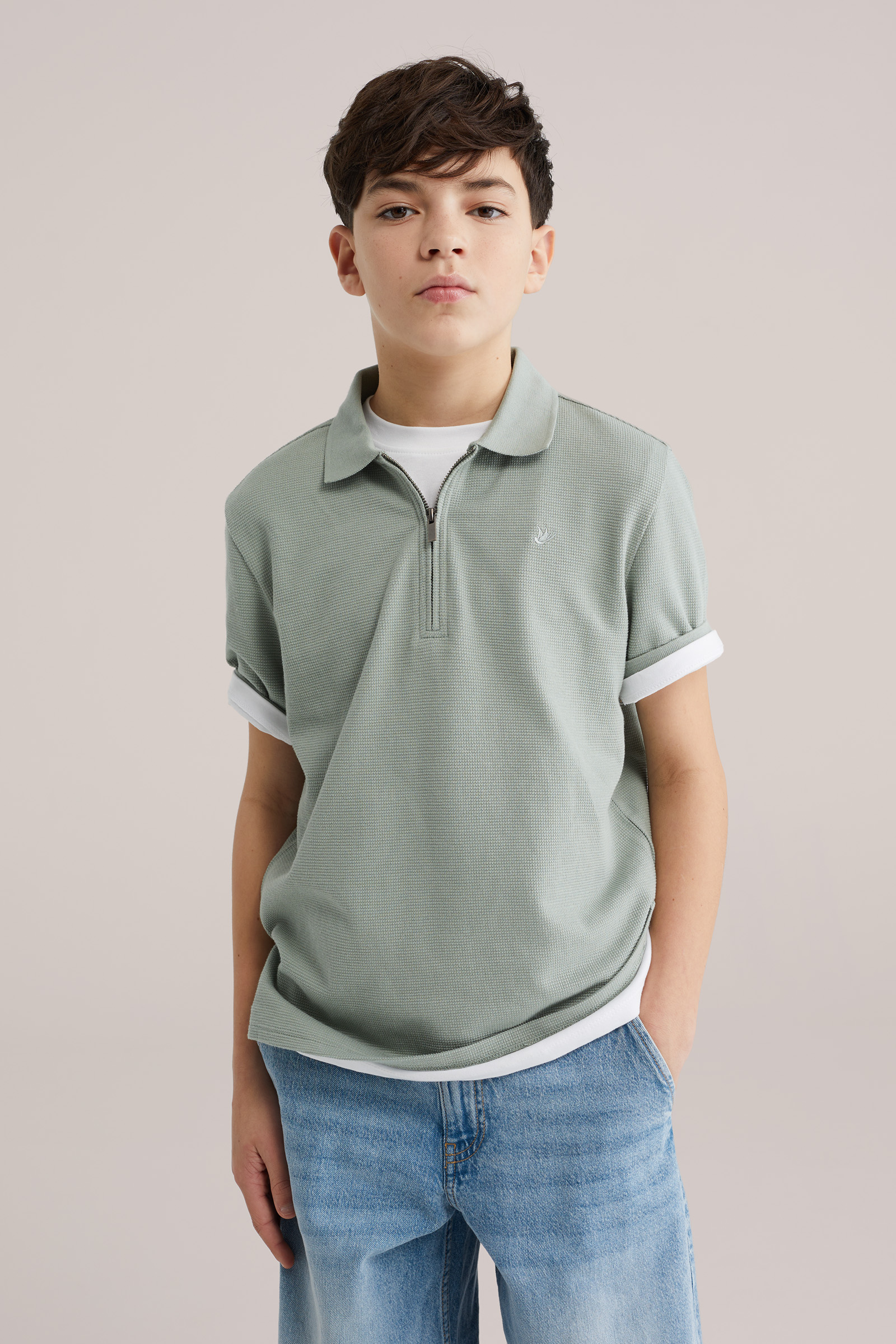 Jongens polo met quarter-zip en embroidery