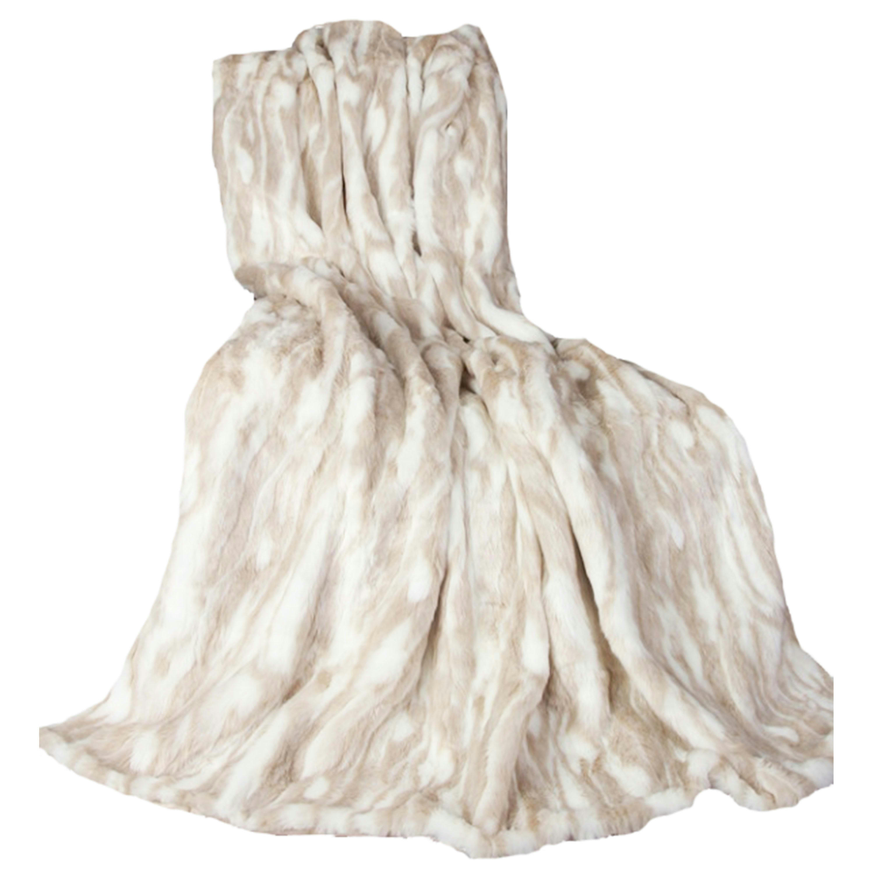 - Plaid en fausse fourrure beige et blanche