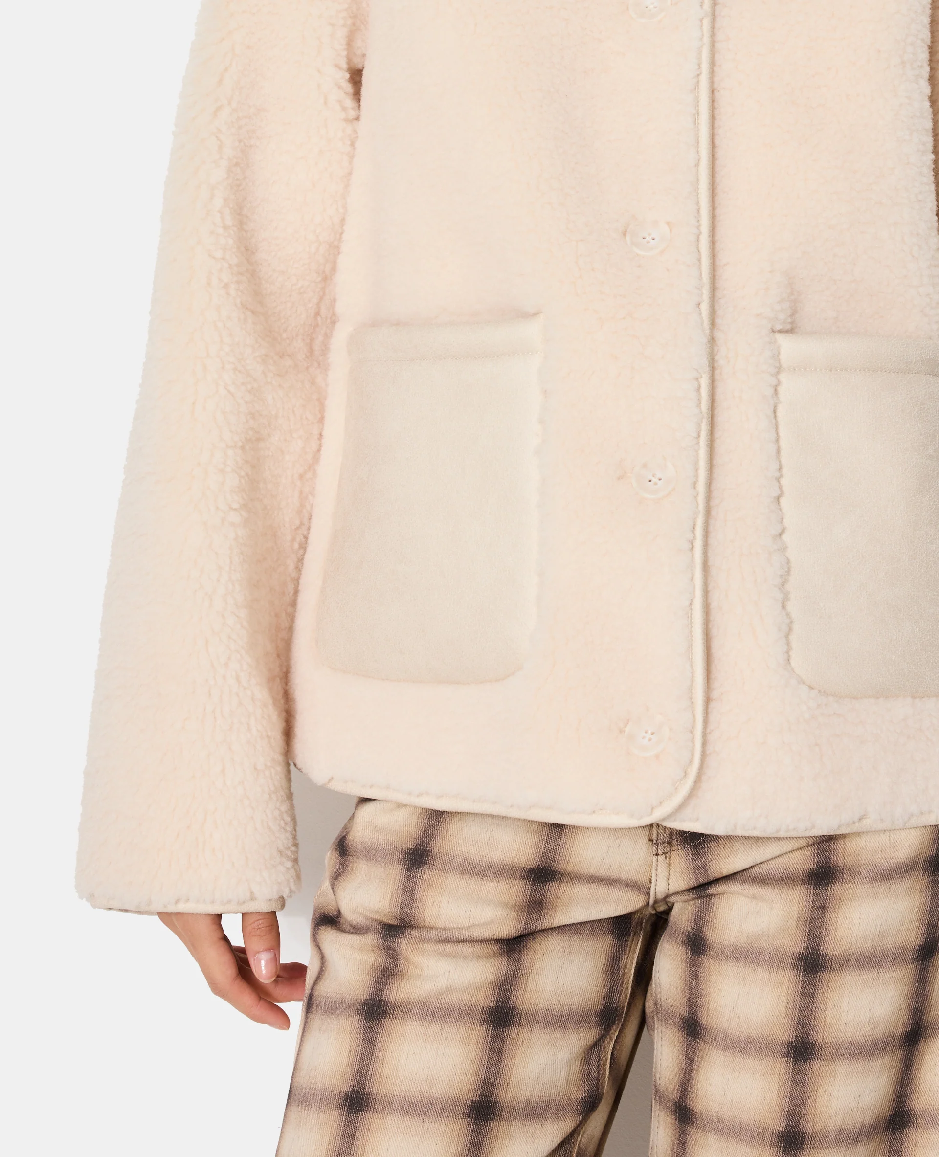 Blouson en sherpa façon peau lainée