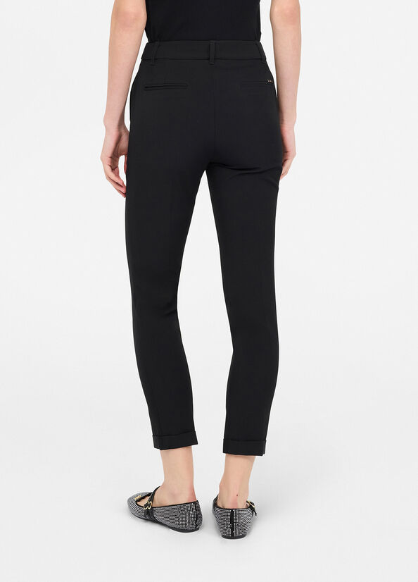 Pantaloni eleganti con risvolto