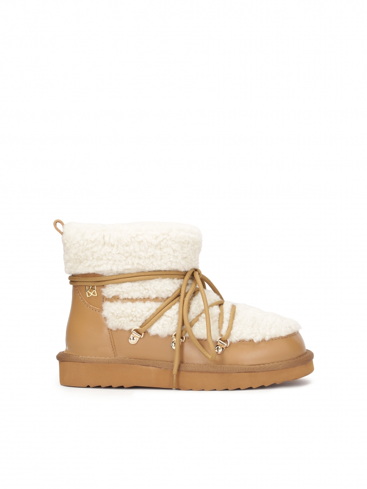 Brown snow boots with fur