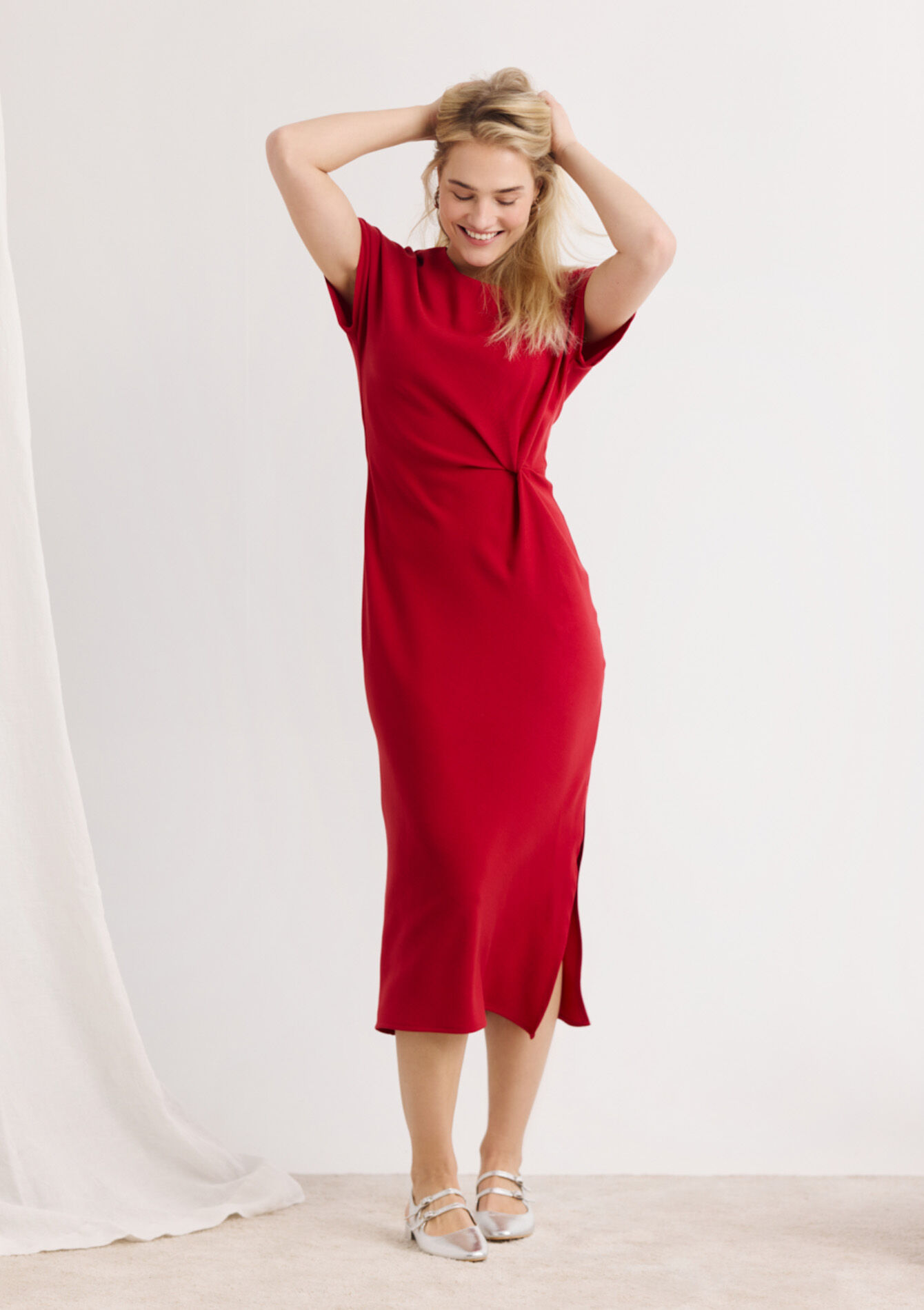 Gedrapeerde midi-jurk