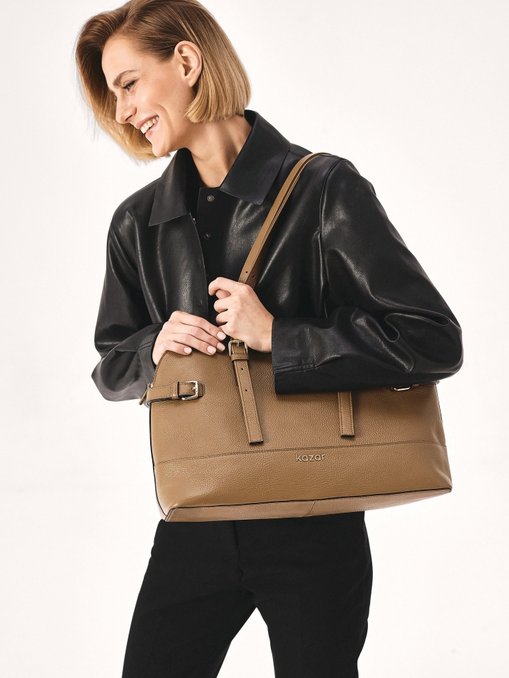Brown handbag with a wide bottom