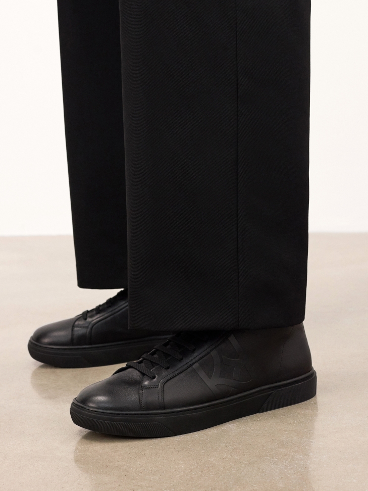 Black natural leather ankle sneakers with embossed logo