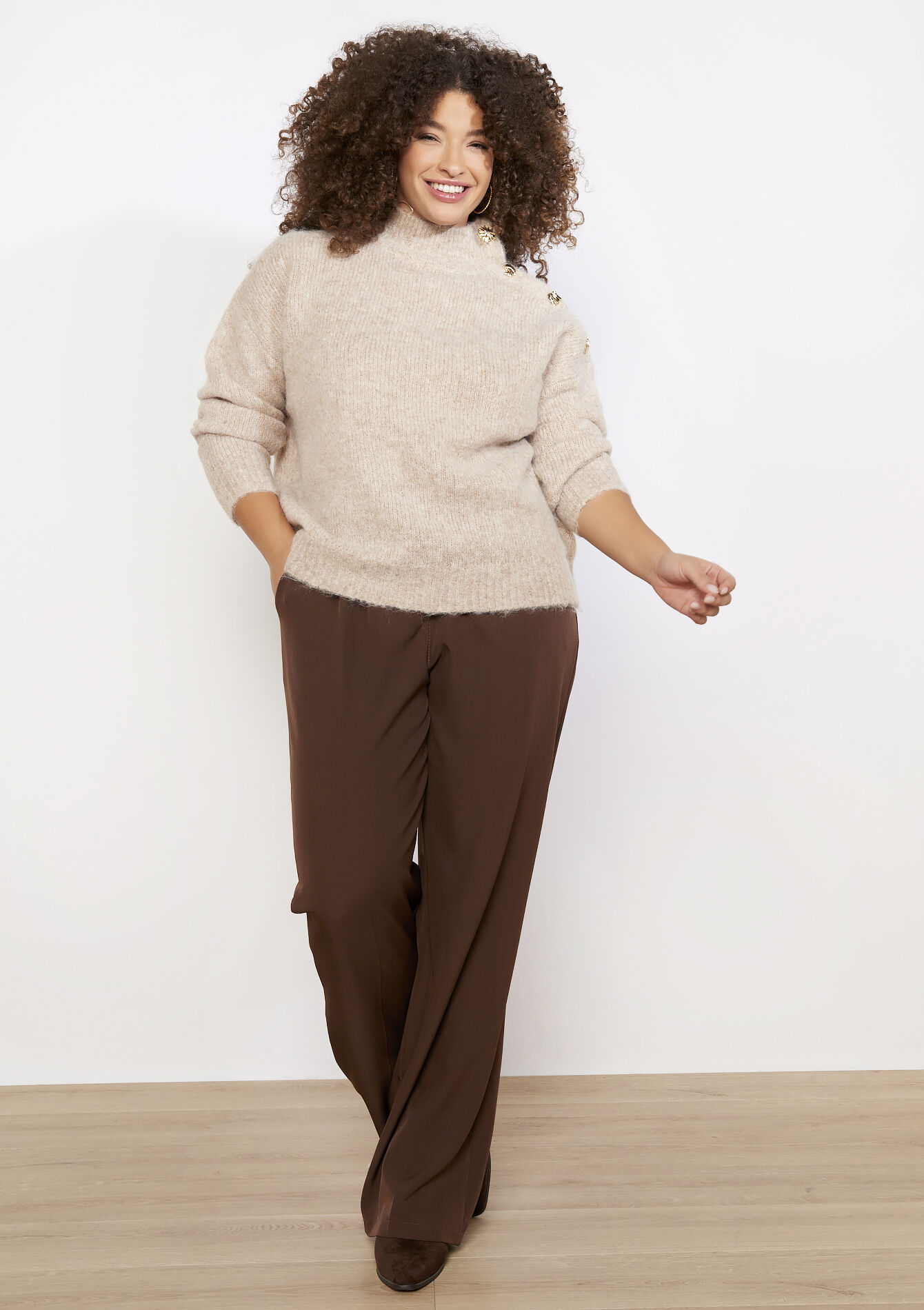 Trui met gouden knopen