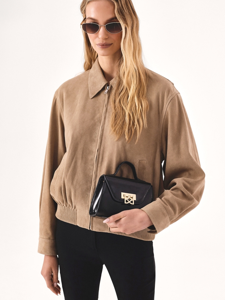 Elegant patent handbag with handle