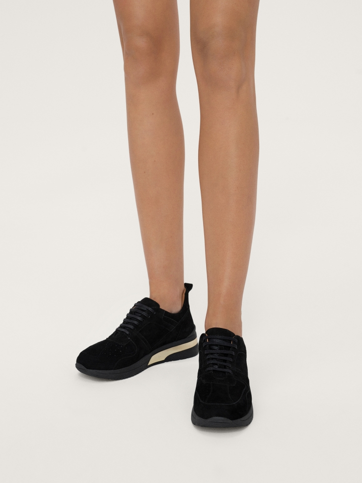Ladies’ black suede sneakers