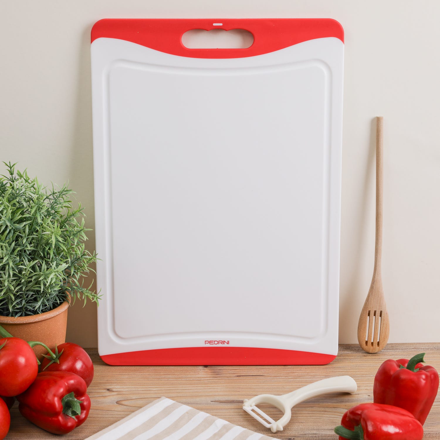 Tagliere 44x30 cm in plastica con bordi in gomma