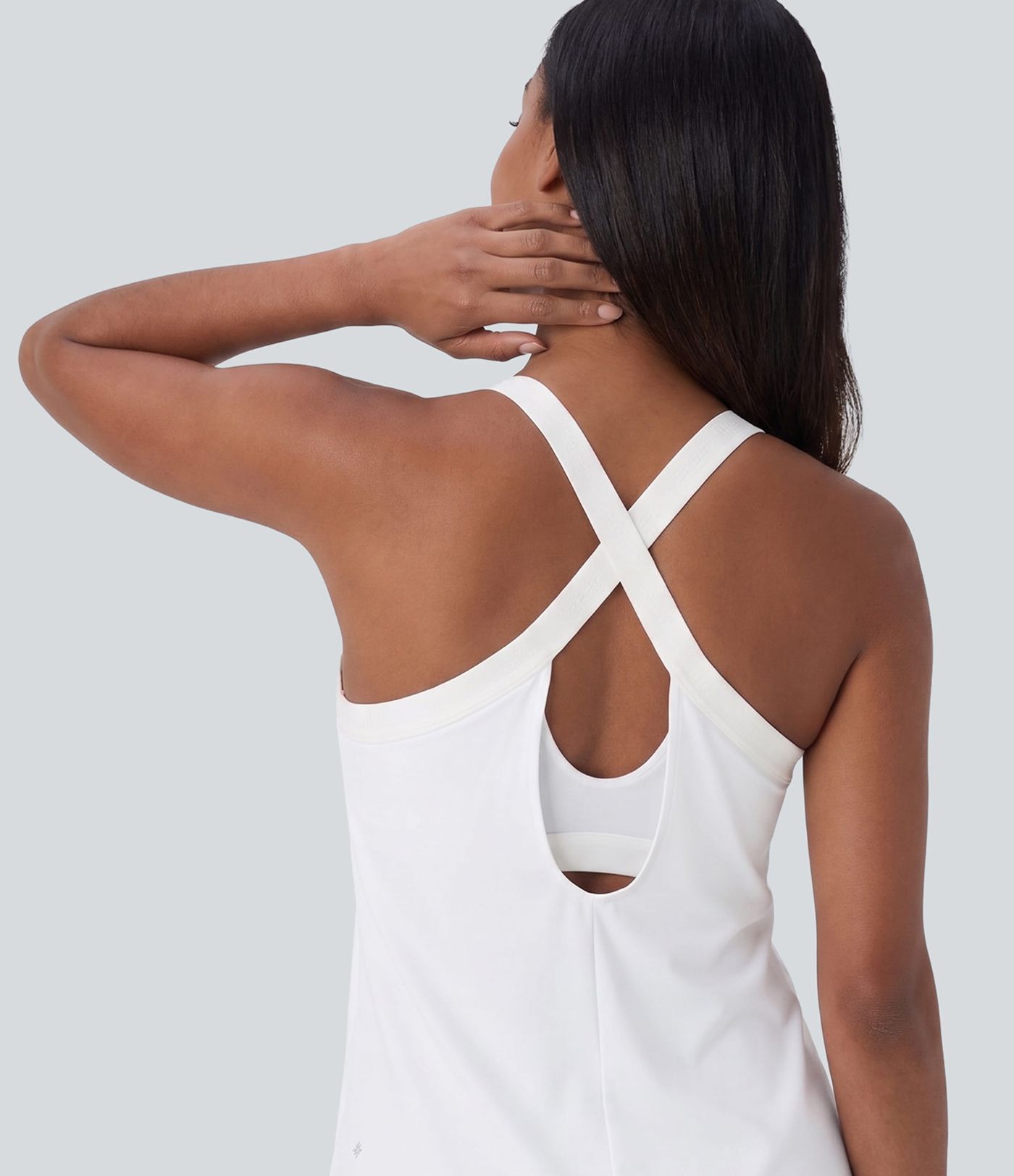 Débardeur yoga dos nu col U avec bretelles croisées, ourlet arrondi et effet frais InstantCool, protection solaire UPF50