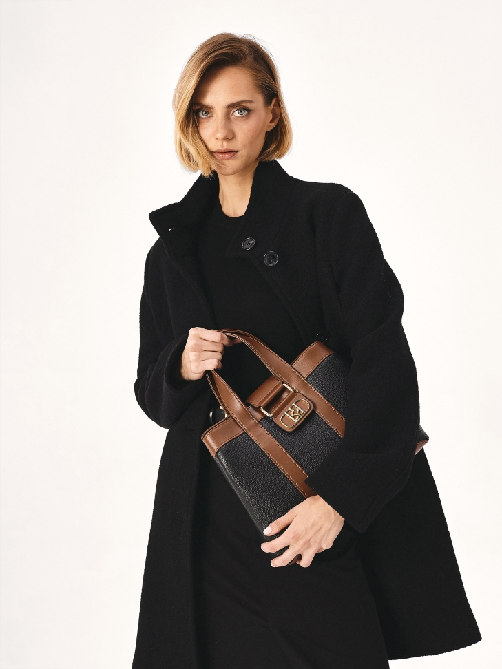 Brown and black handbag with hand grips
