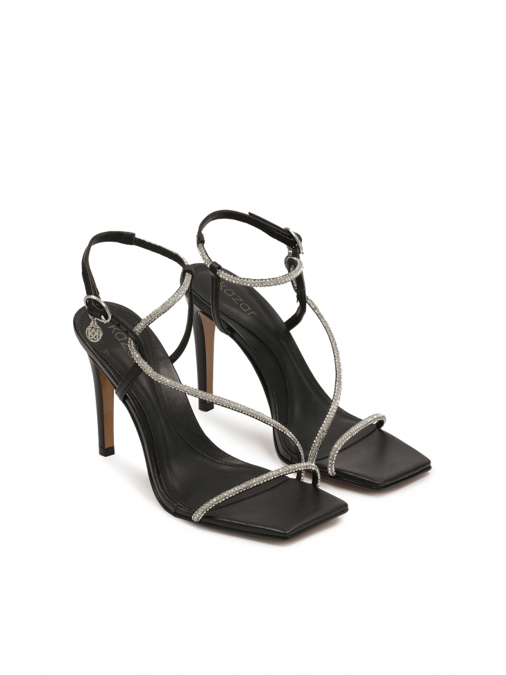 Black sandals with shiny straps