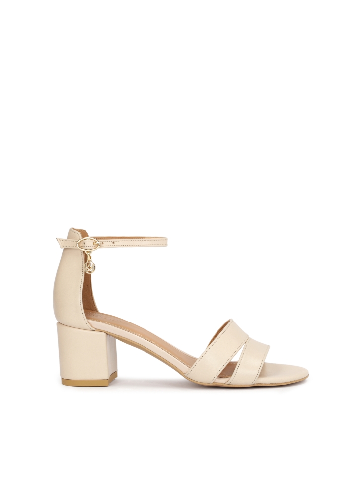 Beige sandals on a wide heel