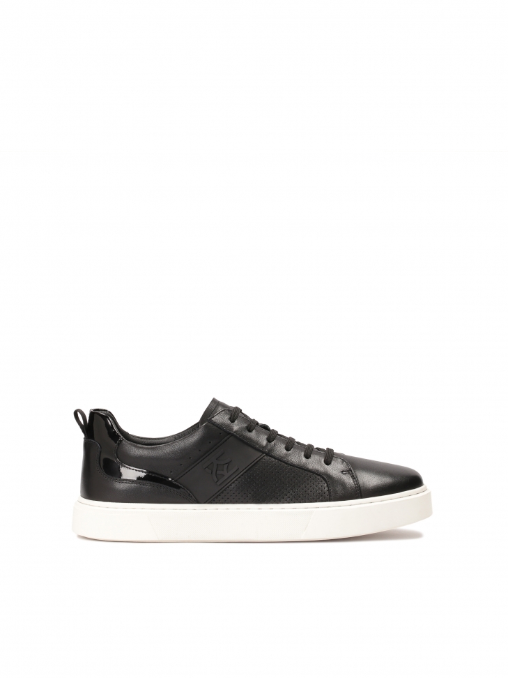 Black leather sneakers on a white sole