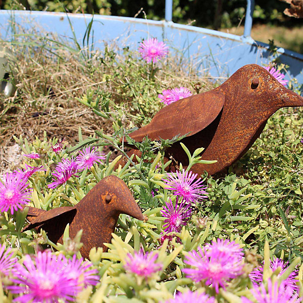 Oiseau décoratif en fer forgé rouillé