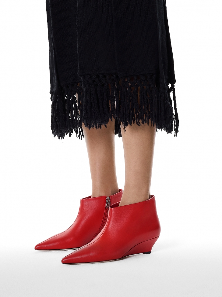 Red boots on low heel