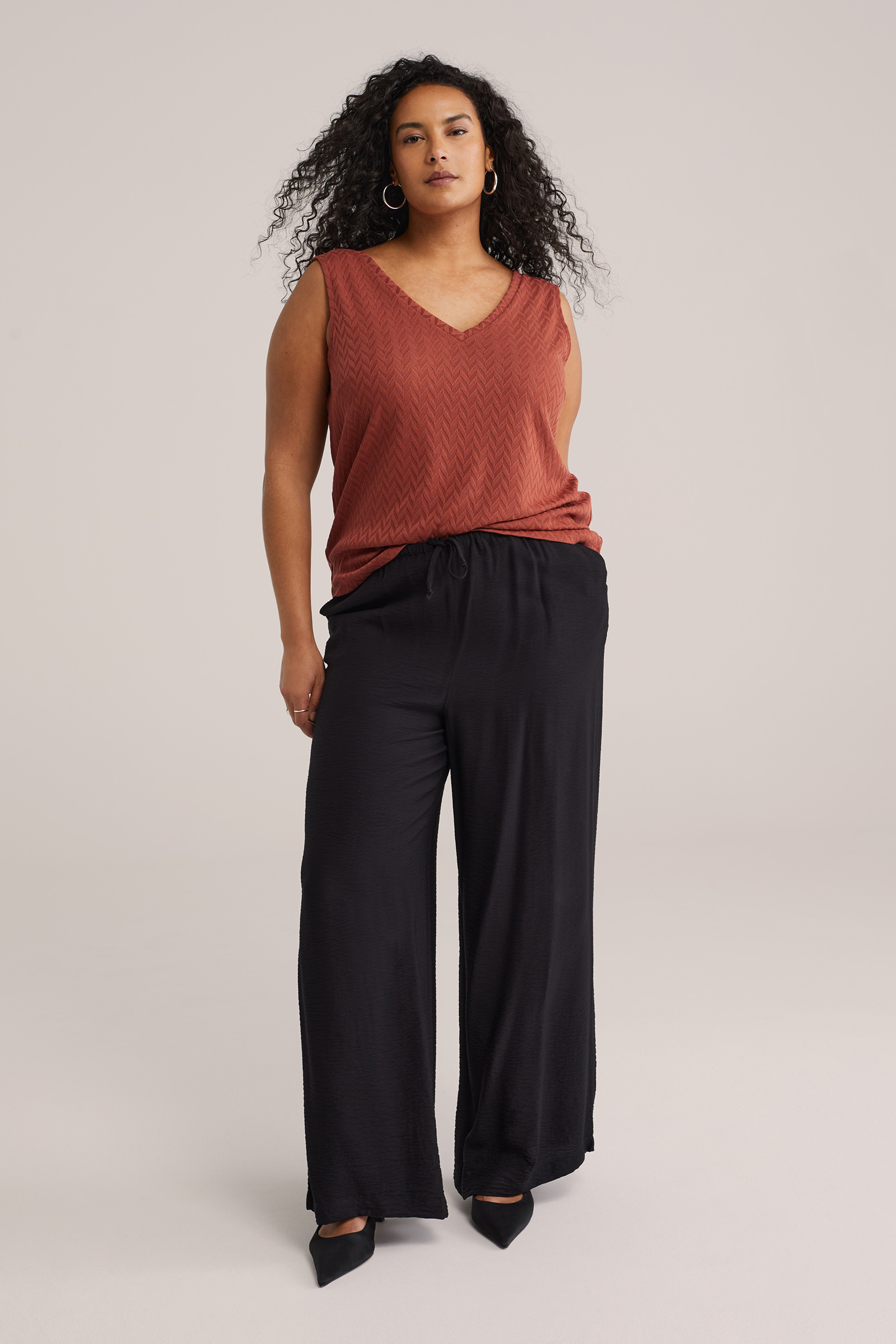 Dames singlet met open structuur - Curve