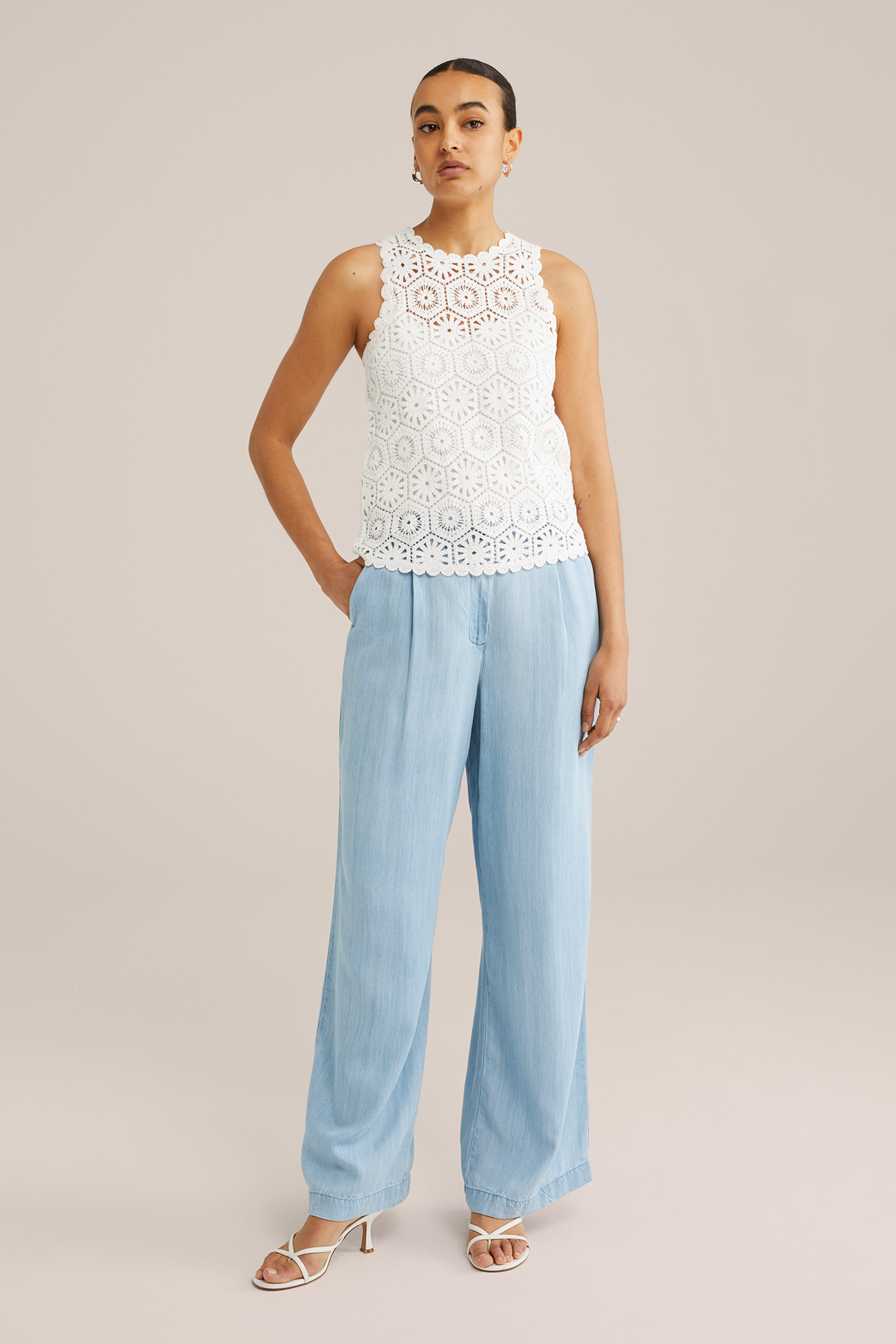 Dames gebreide top met opengewerkte structuur