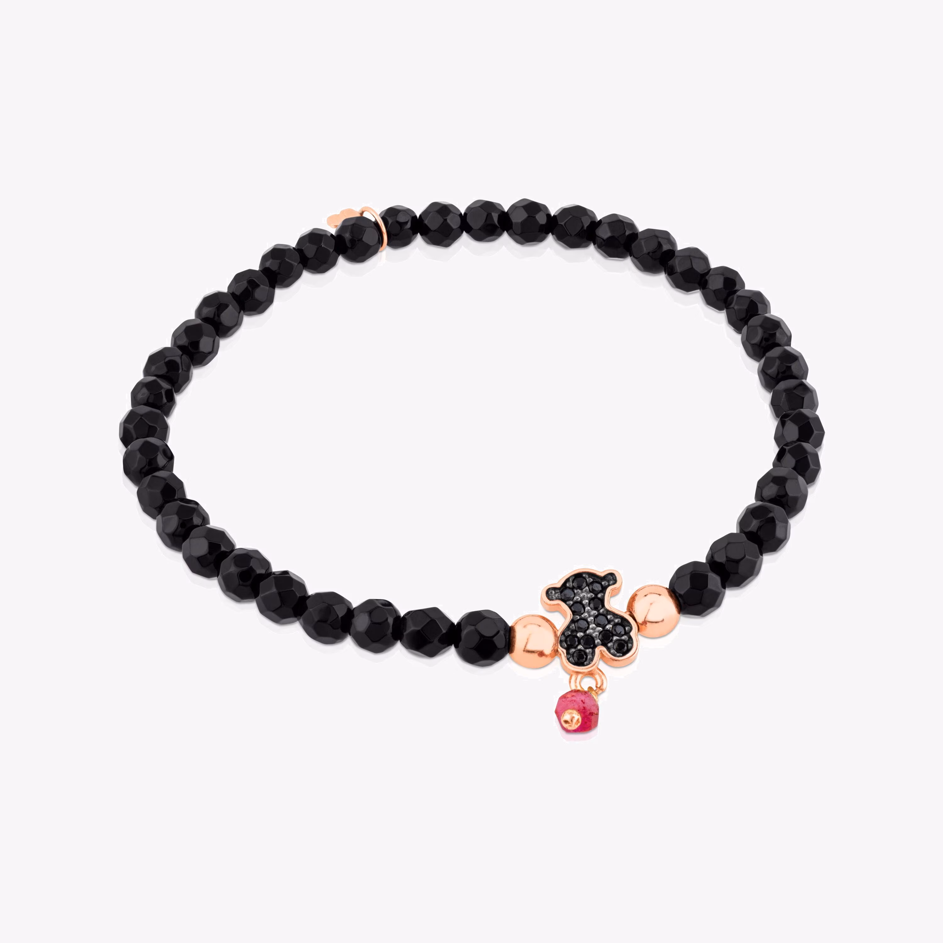 Pulsera con baño de oro rosa 18 kt sobre plata, espinelas y ónix facetado motivo oso Motif