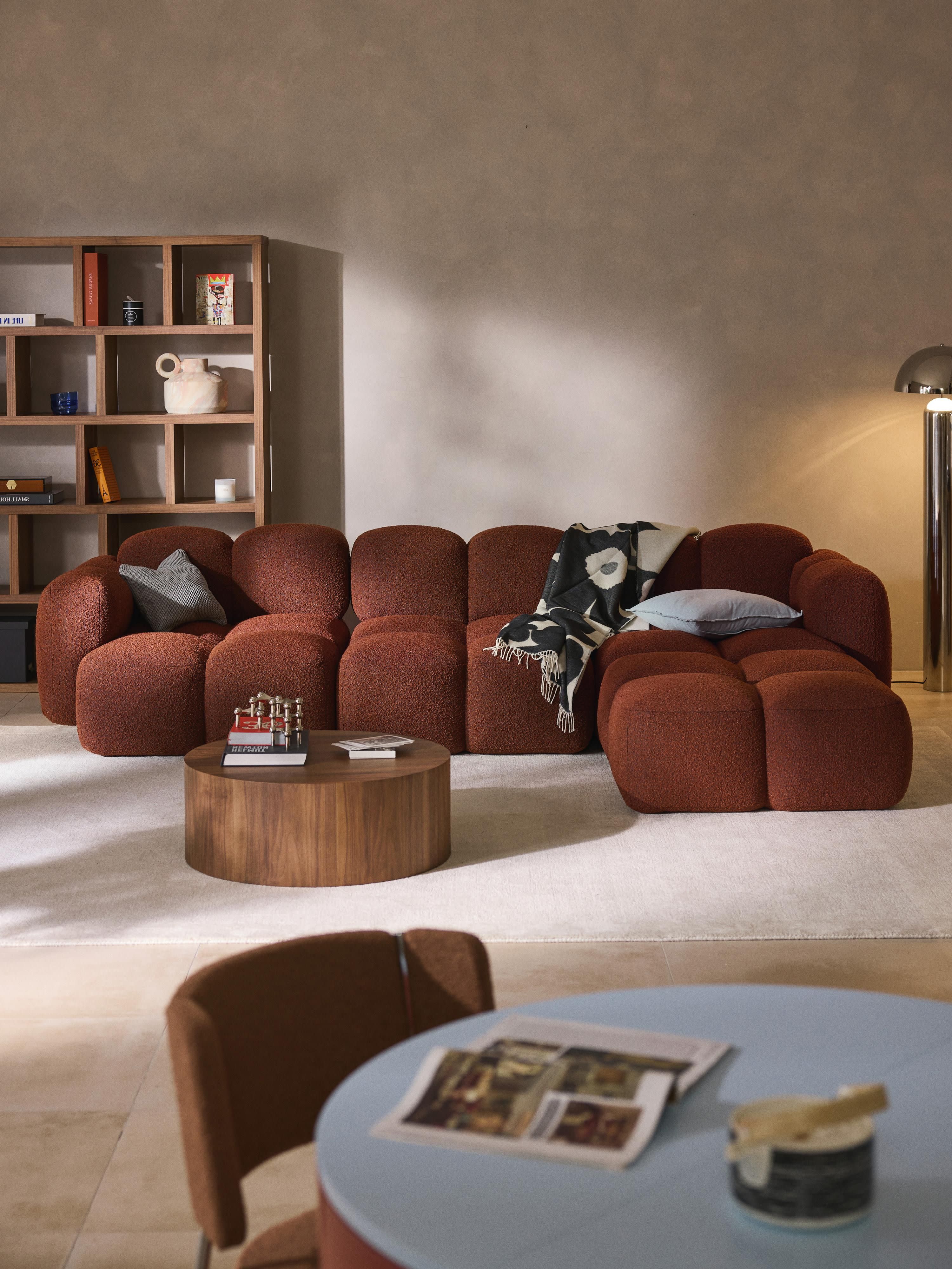Modulares Sofa Tayla (4-Sitzer) aus Bouclé mit Hocker (links/rechts)