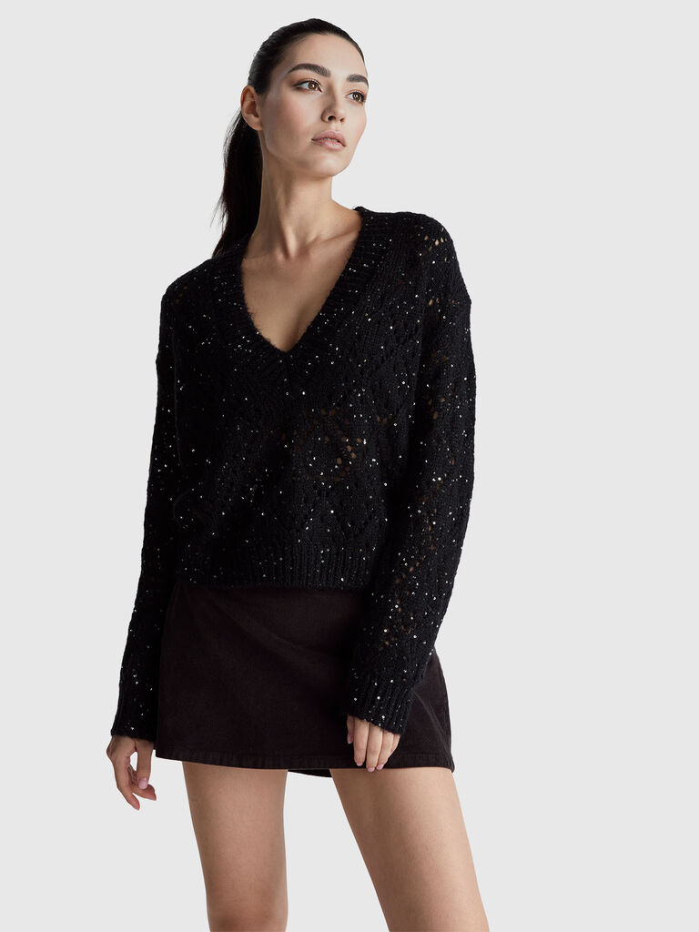 Perforated sweater with sequins