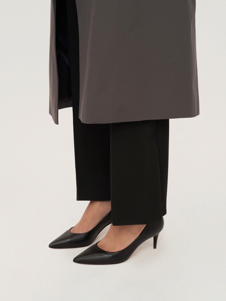 Black leather pumps on a low heel