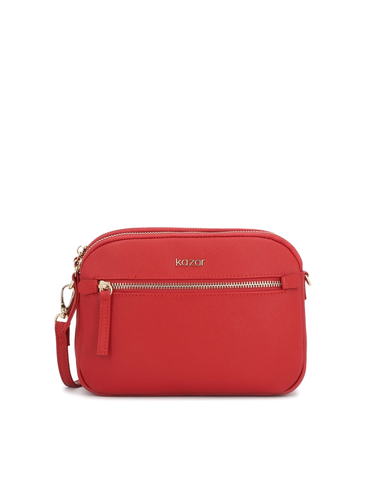 Red leather handbag with three compartments