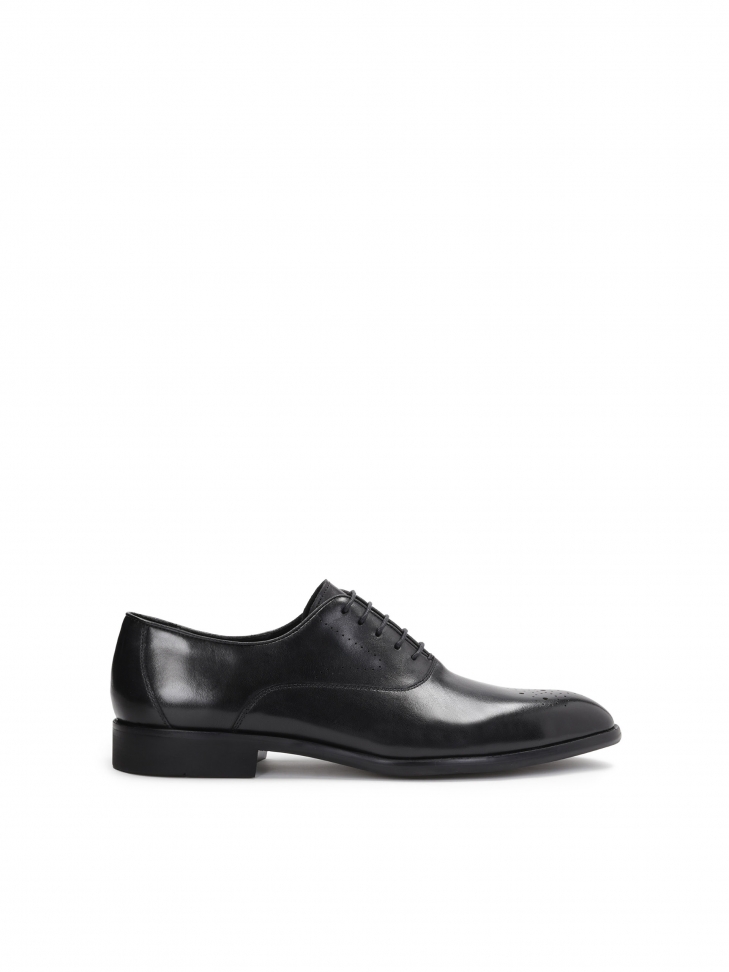 Men’s black oxfords with decorated toes