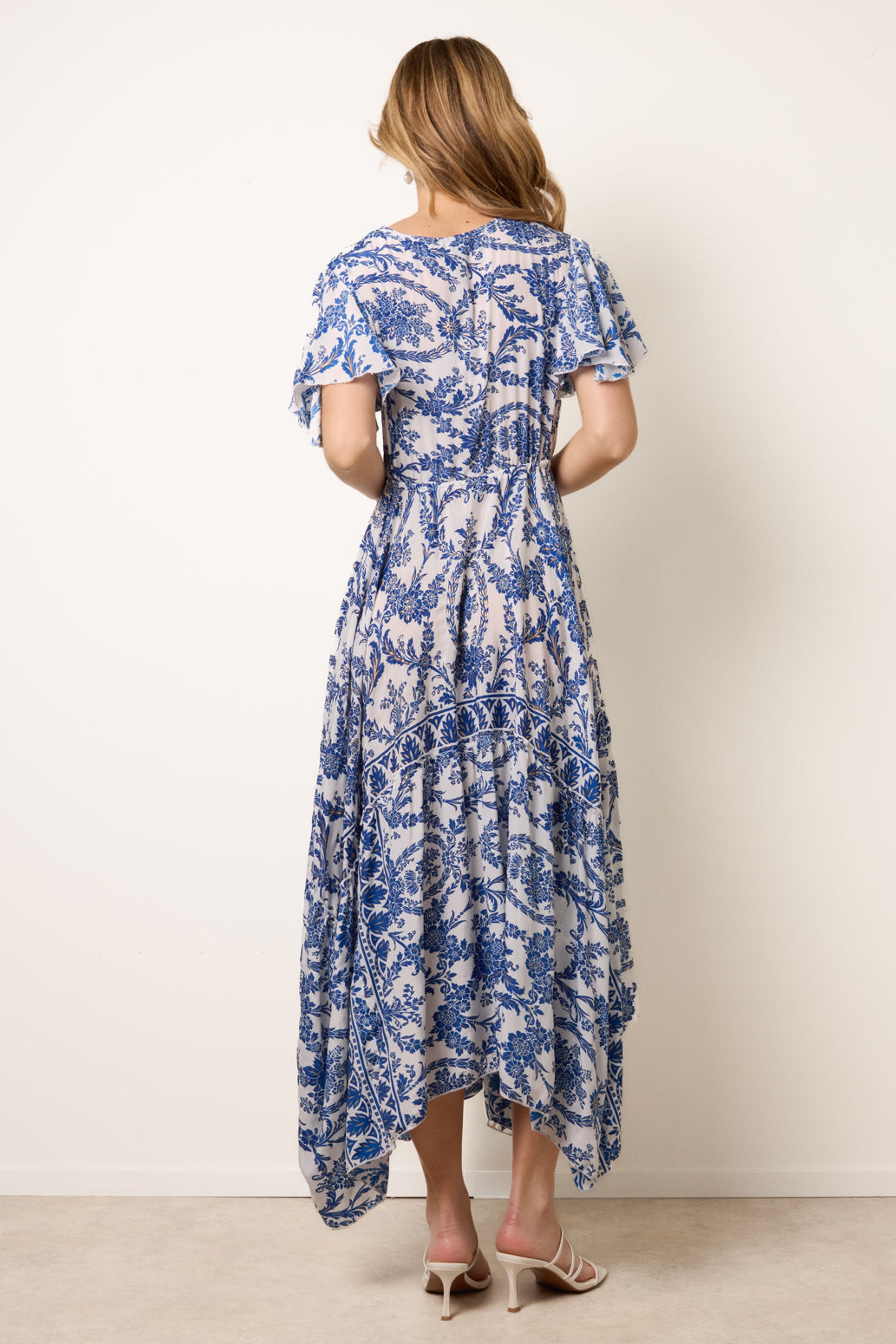 Blue Vanilla Navy Print Asymmetric Hem Wrap Dress