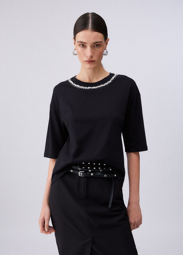 T-shirt con applicazioni