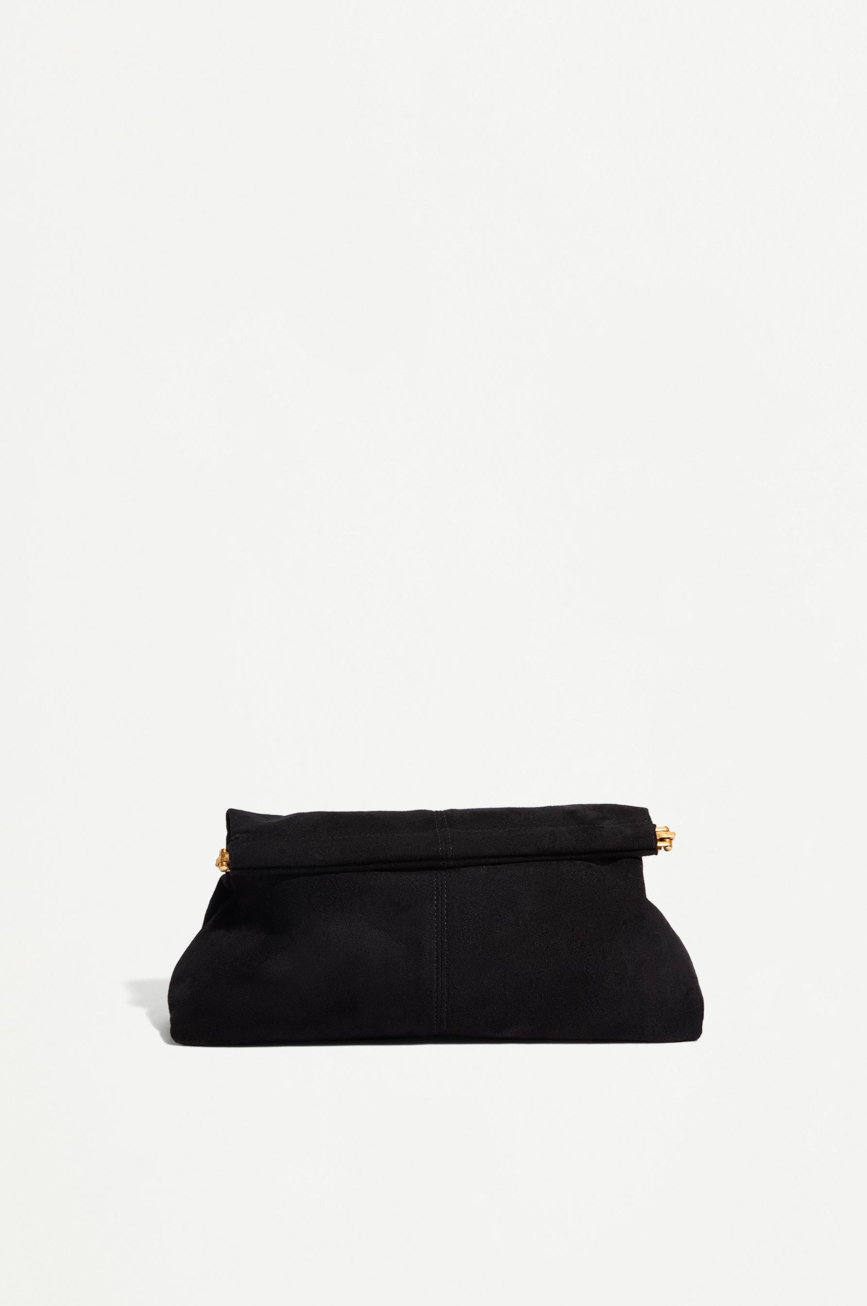 Bolso de mano tipo pouch efecto ante
