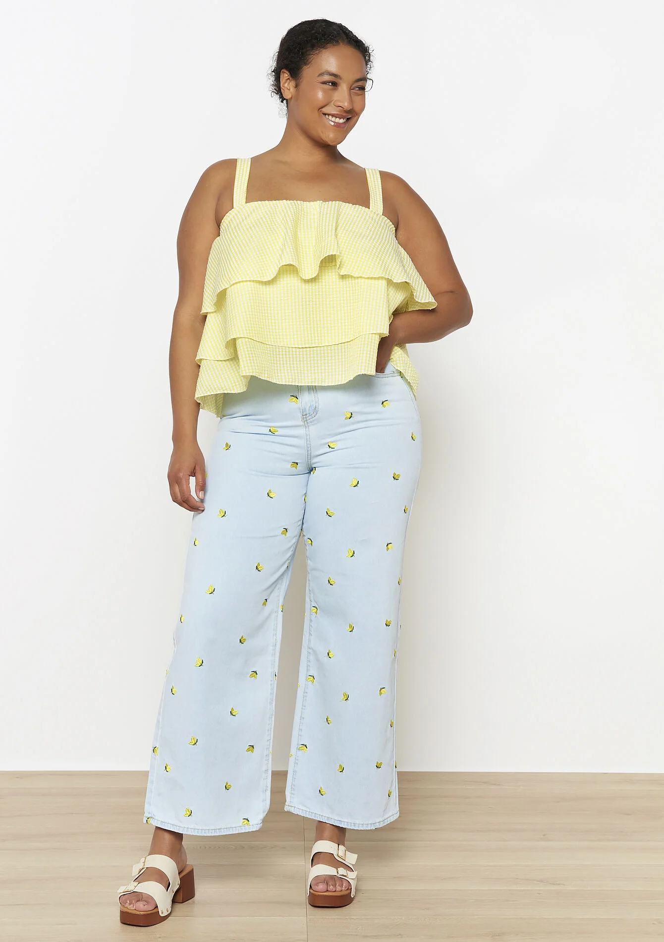 Geruite volantenblouse