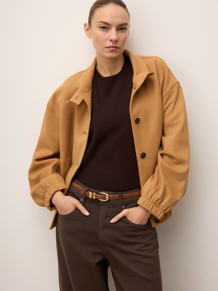 Narrow leather strap with two metal loops