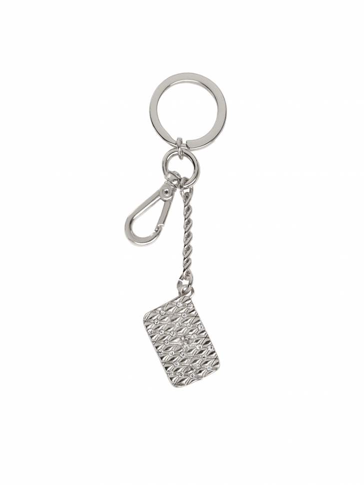 Metal key ring with pendant in the shape of a small handbag